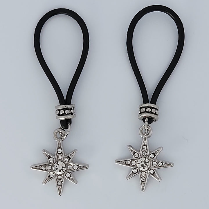 Two 8-Pointed Star with Faux Diamond Gem Stone Nipple Nooses Against a White Background